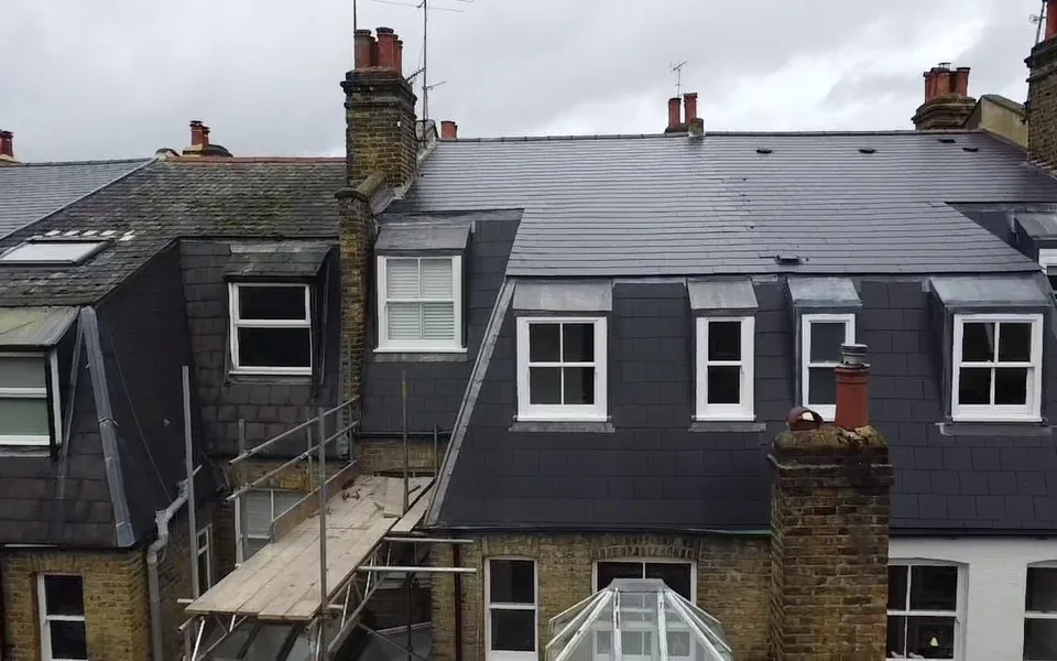 Victorian terrace re-slated with chimney stacks repointed, new lead flashings and dormer cheeks